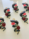 Serpent floral earrings