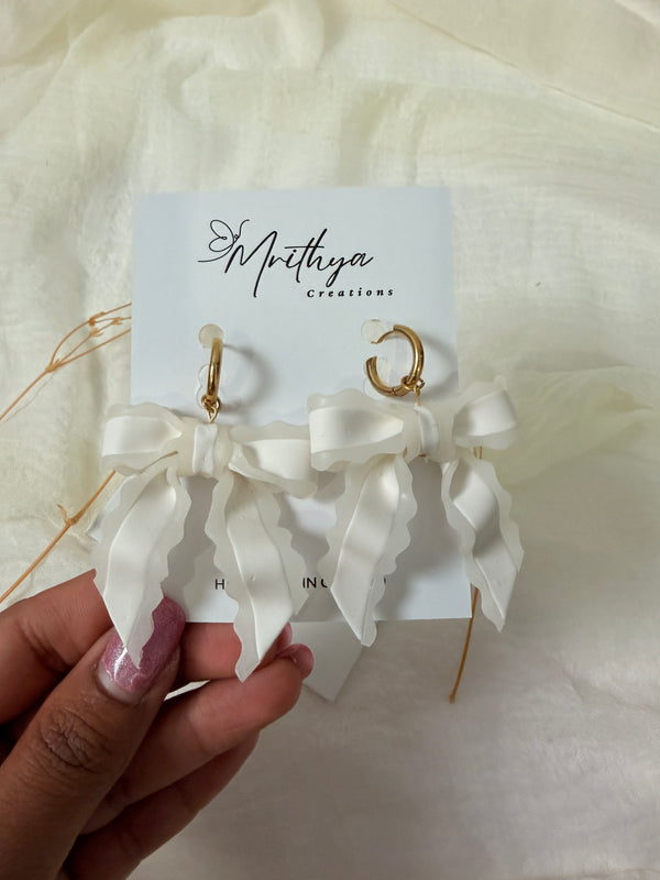 Sheer white bow