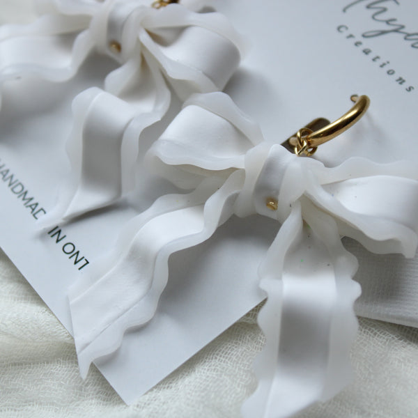 Sheer white bow