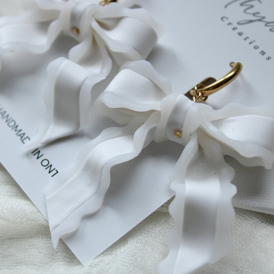 Sheer white bow