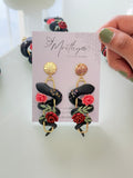 Serpent floral earrings