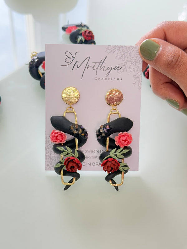 Serpent floral earrings