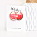Red hoop earring