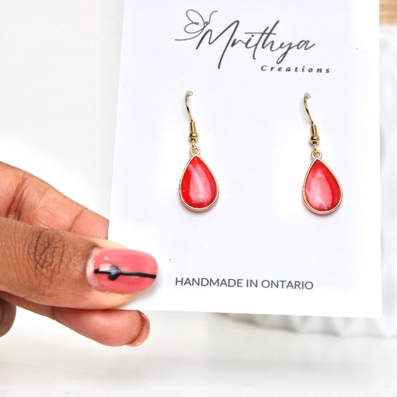 Red gold tear drop earring